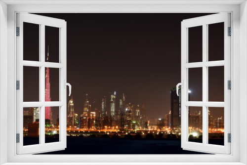 Fototapeta Naklejka Na Ścianę Okno 3D - Dubai skyline at night from Meydan, United Arab Emirates
