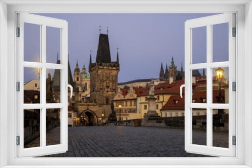 View from Charles bridge in Prague with red roofs, Czech Republic.