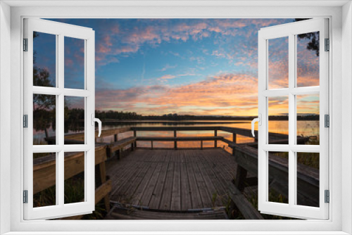 Fototapeta Naklejka Na Ścianę Okno 3D - Wooden pier on lake sunset.
