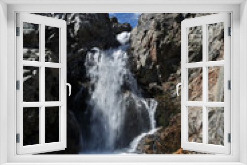 Fototapeta Naklejka Na Ścianę Okno 3D - Waterfall on mountain river and blue sky with clouds