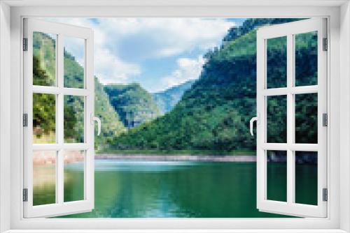 Fototapeta Naklejka Na Ścianę Okno 3D - The lake and mountains scenery with blue sky