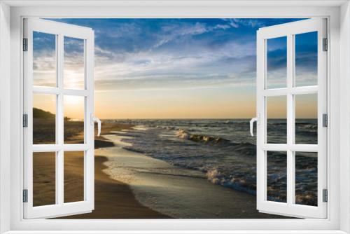 Fototapeta Naklejka Na Ścianę Okno 3D - Sunset at a beach