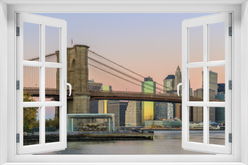 Fototapeta Naklejka Na Ścianę Okno 3D - View to Manhattan skyline from Brooklyn Bridge Park in the morning
