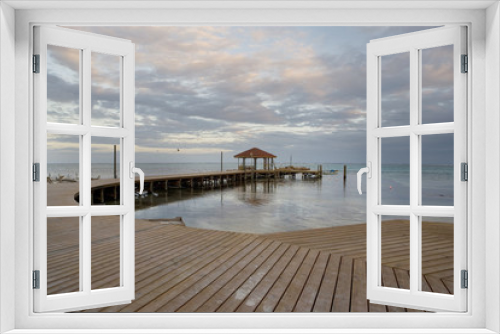 Fototapeta Naklejka Na Ścianę Okno 3D - New Pier and Hut at Sunset