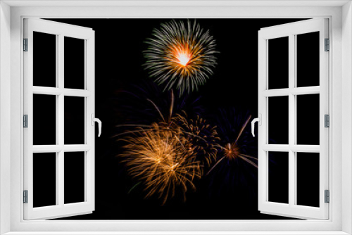 Fototapeta Naklejka Na Ścianę Okno 3D - Fireworks in the night.New Year celebration fireworks,Colorful fireworks over dark sky, displayed during a celebration event