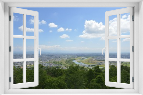 Fototapeta Naklejka Na Ścianę Okno 3D - 嵐山から見た旭川市の風景