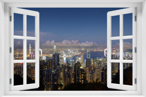 Fototapeta Naklejka Na Ścianę Okno 3D - Hong Kong's famous skyline viewed from the Victoria Peak in the evening. Copy space.