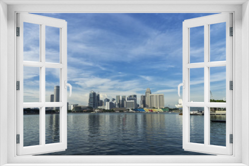 Fototapeta Naklejka Na Ścianę Okno 3D - abstract cityscape at waterfront in day time blue sky - can use to display or montage on product
