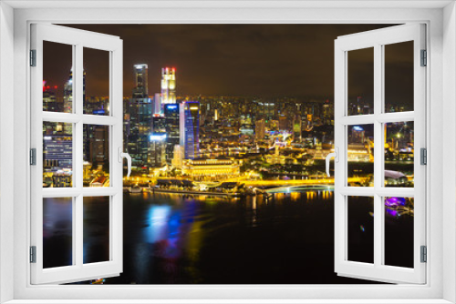 Fototapeta Naklejka Na Ścianę Okno 3D - Landscape of the Singapore financial district and business building in evening lights from sands SkyPark observation deck