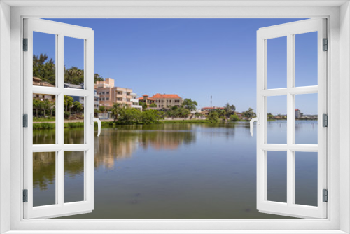 Buildings reflecting on the lake in Torres