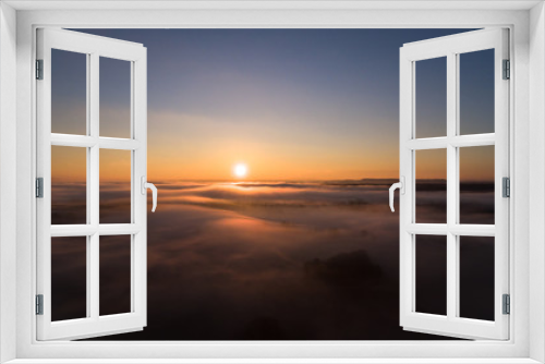 Fototapeta Naklejka Na Ścianę Okno 3D - Sonnenaufgang über den Wolken