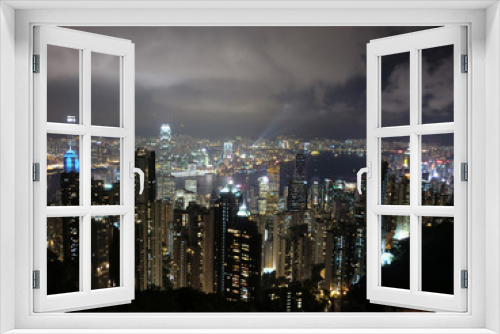 Fototapeta Naklejka Na Ścianę Okno 3D - Hong Kong city skyline illuminated at night from the peak
