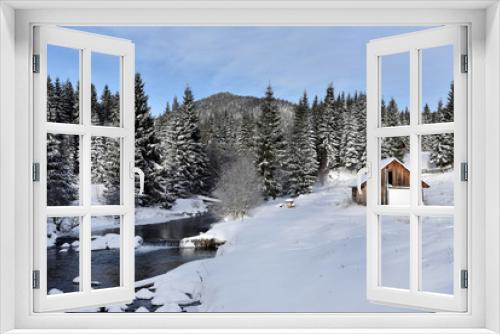 Fototapeta Naklejka Na Ścianę Okno 3D - Alpine house covered with snow in the mountains