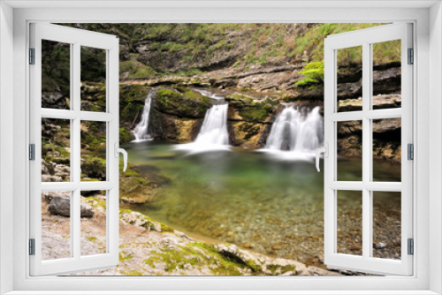 Fototapeta Naklejka Na Ścianę Okno 3D - long exposure of three little waterfalls at a mountain creek in Bavarian Alps