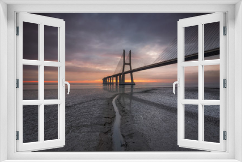 Fototapeta Naklejka Na Ścianę Okno 3D - Sunrise at Vasco da Gama Bridge, New day at Lisboa