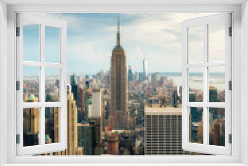 Fototapeta Naklejka Na Ścianę Okno 3D - NEW YORK CITY: Observers view Midtown from Top of the Rock Rockefeller center. Manhattan is often described as the cultural and financial capital of the world.