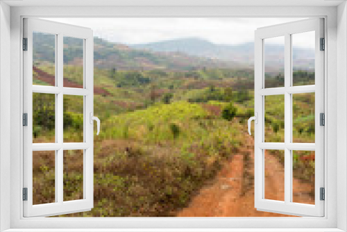 Fototapeta Naklejka Na Ścianę Okno 3D - Rural road in mountain, north of Thailand