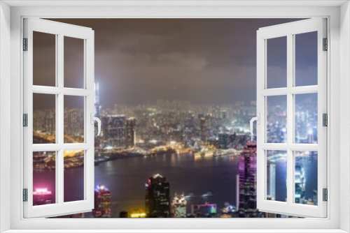 Fototapeta Naklejka Na Ścianę Okno 3D - ​
Hong Kong, China skyline panorama from across Victoria Harbor. Hong Kong city skyline view from harbor with skyscrapers buildings reflect in water at sunset
