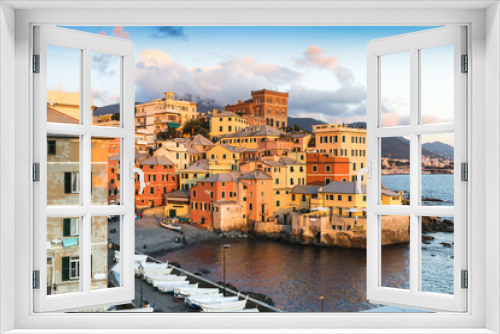 Fototapeta Naklejka Na Ścianę Okno 3D - Italy Liguria Genoa Panoramic view of Bocadasse district at sunset, a set of old colorful houses overlooking the sea and what was once a fishing village