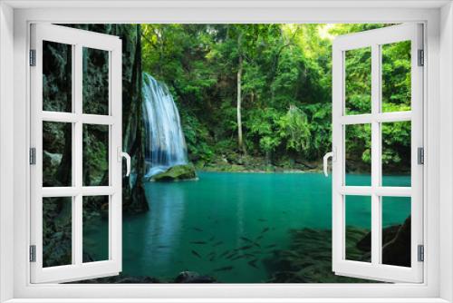 Fototapeta Naklejka Na Ścianę Okno 3D - Breathtaking Green waterfall in deep forest, Erawan waterfall located Kanchanaburi Province , Thailand