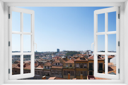 Fototapeta Naklejka Na Ścianę Okno 3D - Portogallo, 26/03/2012: lo skyline di Porto, la seconda città più grande del Paese, con vista panoramica sui tetti rossi, i palazzi e gli edifici della città vecchia