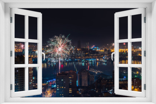Fototapeta Naklejka Na Ścianę Okno 3D - Colorful fireworks over city.