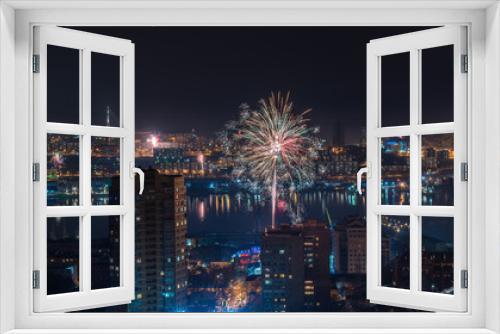 Fototapeta Naklejka Na Ścianę Okno 3D - Colorful fireworks over city.