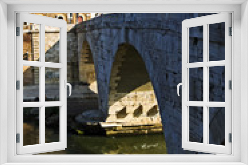 Fototapeta Naklejka Na Ścianę Okno 3D - ponte sull'isola Tiberina a Roma in Italia