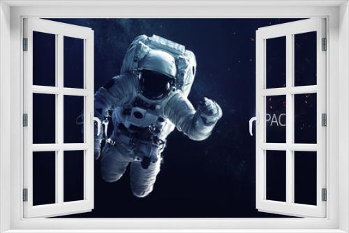 Fototapeta Naklejka Na Ścianę Okno 3D - Astronaut at spacewalk. Cosmic art, science fiction wallpaper. Beauty of deep space. Billions of galaxies in the universe. Elements of this image furnished by NASA