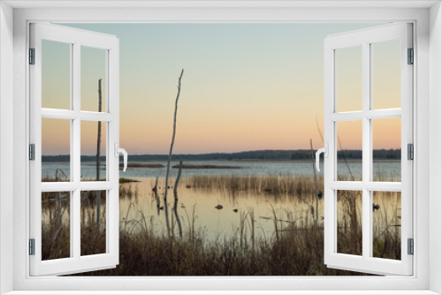 Fototapeta Naklejka Na Ścianę Okno 3D - Sunrise and Silhouettes at Otter Lake