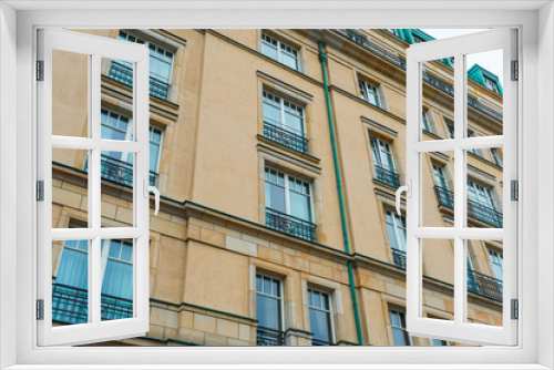Fototapeta Naklejka Na Ścianę Okno 3D - historical hotel facade in orange colors