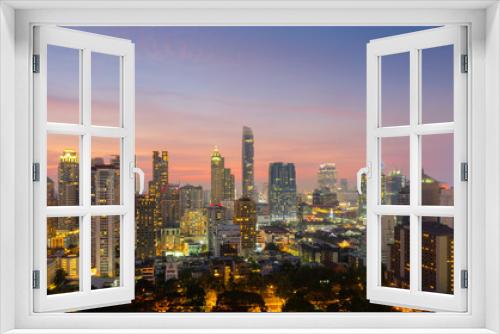 Fototapeta Naklejka Na Ścianę Okno 3D - Top view of Bangkok modern office buildings, condominium in Bangkok city downtown with sunset sky ,Bangkok is the most populated city in Southeast Asia. Bangkok , Thailand