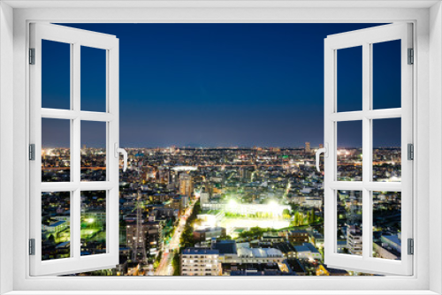 Fototapeta Naklejka Na Ścianę Okno 3D - Business and culture concept for real estate and corporate construction - panoramic modern city skyline bird eye aerial night view under dramatic neon glow and beautiful dark blue sky in Tokyo, Japan