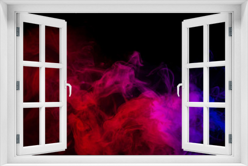 Abstract smoke Weipa. Personal vaporizers fragrant steam. The concept of alternative non-nicotine smoking. Purple pink smoke on a black background. E-cigarette. Evaporator. Taking Close-up. Vaping.