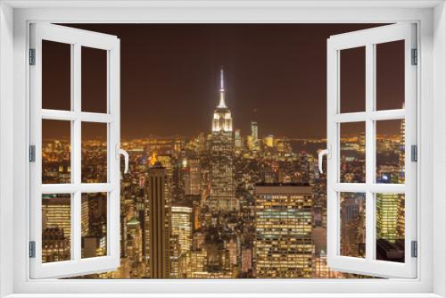 Fototapeta Naklejka Na Ścianę Okno 3D - View of New York Manhattan during sunset hours