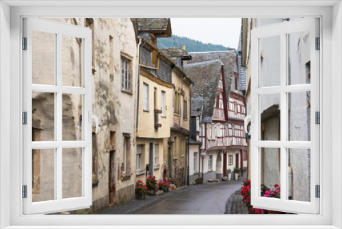 Fototapeta Naklejka Na Ścianę Okno 3D - The central street of the medieval village of  Enkirch situated on the  Moselle river, Germany