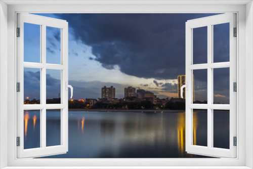 Fototapeta Naklejka Na Ścianę Okno 3D - Linh Dam lake at sunset with cloudy sky. Hanoi cityscape