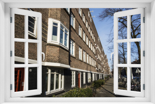 Fototapeta Naklejka Na Ścianę Okno 3D - Apartment buildings from the 30s in Amsterdam - The Netherlands