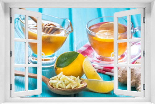 Fototapeta Naklejka Na Ścianę Okno 3D - Ginger tea with lemon in a cup