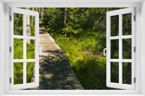 Fototapeta Naklejka Na Ścianę Okno 3D - A wooden walkway