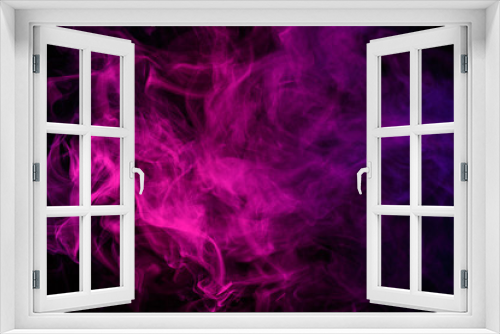 Abstract smoke Weipa. Personal vaporizers fragrant steam. The concept of alternative non-nicotine smoking. Magenta smoke on a black background. E-cigarette. Evaporator. Taking Close-up. Vaping.