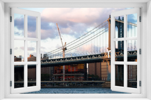 Fototapeta Naklejka Na Ścianę Okno 3D - Manhattan bridge and the city with cloudy sunset sky, New York