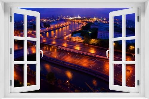 Fototapeta Naklejka Na Ścianę Okno 3D - View of the city from a tall building