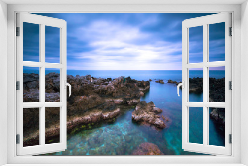 Fototapeta Naklejka Na Ścianę Okno 3D - Stones in the sea on a long exposure 