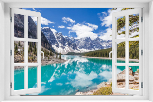 Fototapeta Naklejka Na Ścianę Okno 3D - Moraine lake in Banff National Park, Canadian Rockies, Canada. Sunny summer day with amazing blue sky. Majestic mountains in the background. Clear turquoise blue water.