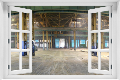 Fototapeta Naklejka Na Ścianę Okno 3D - Interior of an abandoned car factory