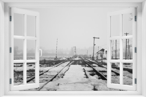Fototapeta Naklejka Na Ścianę Okno 3D - Old, rural railroads and railway station in winter time
