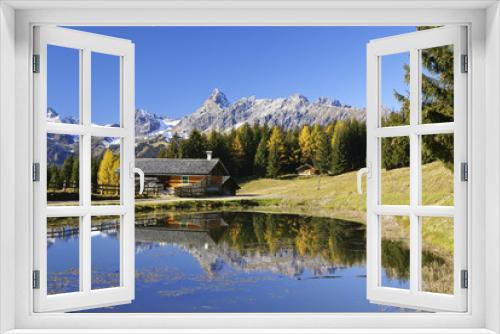 Fototapeta Naklejka Na Ścianę Okno 3D - Bergsee mit Häuschen