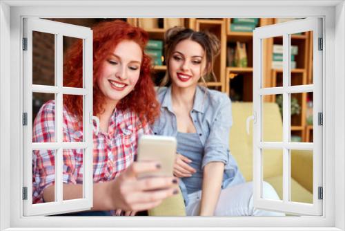 Two female taking photo