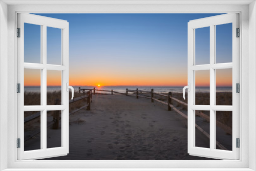 Fototapeta Naklejka Na Ścianę Okno 3D - Jersey shore sunrise along a path leading to the ocean